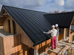 full-shot-roofers-working-together-with-helmets_23-2149343707